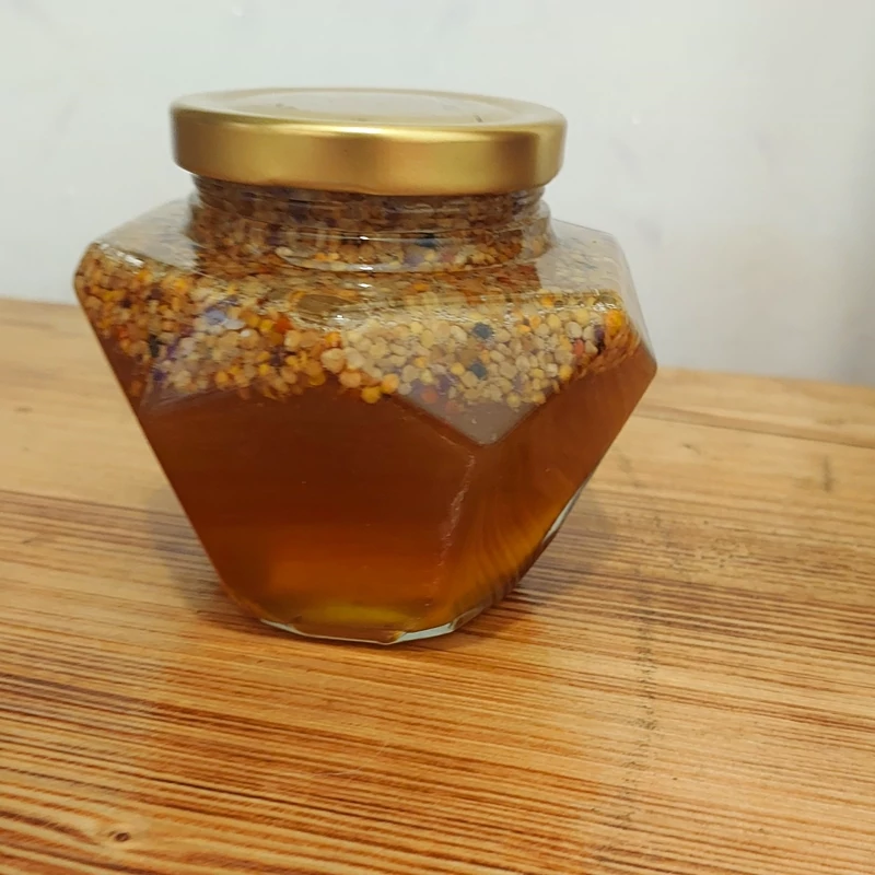 عسل کوهی درمانی ( 500 گرم )با ساکارز (قند طبیعی)پائین تر از 2 با ترکیب 15 گرم ژل رویال و 50 گرم گرده گل (با تضمین کیفیت)